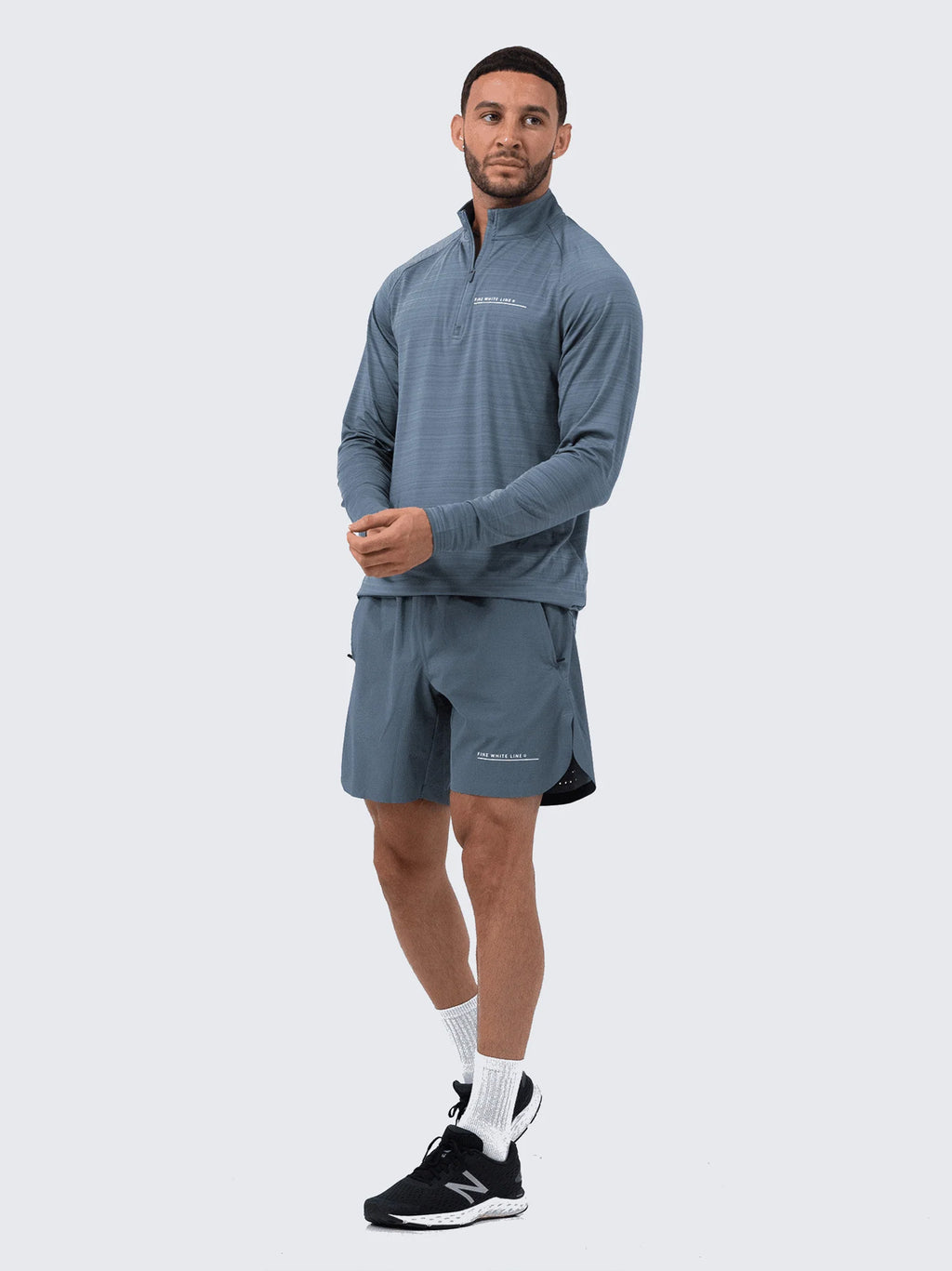 Blue Comet Quarter Zip Top