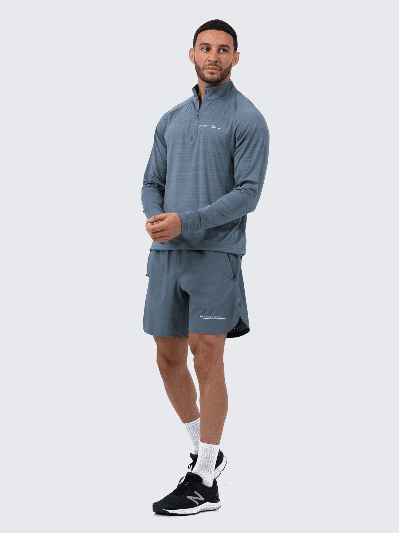 Blue Comet Quarter Zip Top